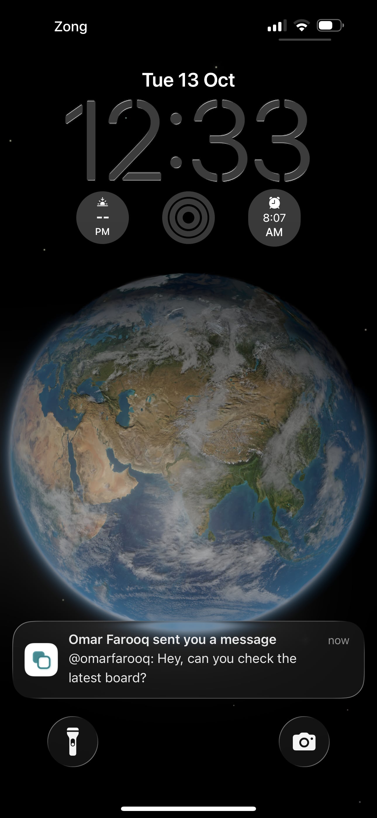 A Crewdesk notification on an iPhone lock screen